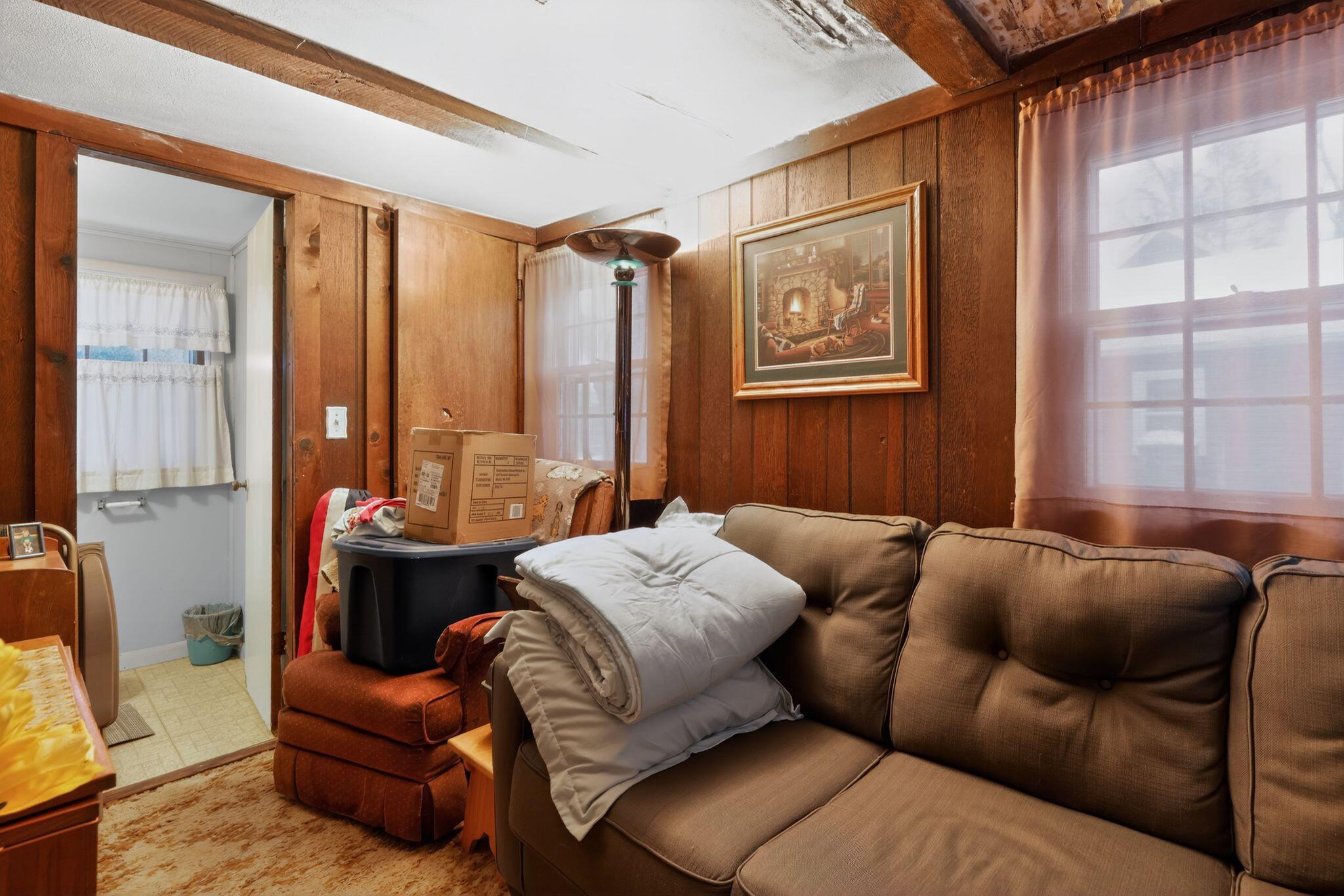 1027 Fox Street La Porte, IN 46350 - Photo 5 of 16 a living room with furniture and a window