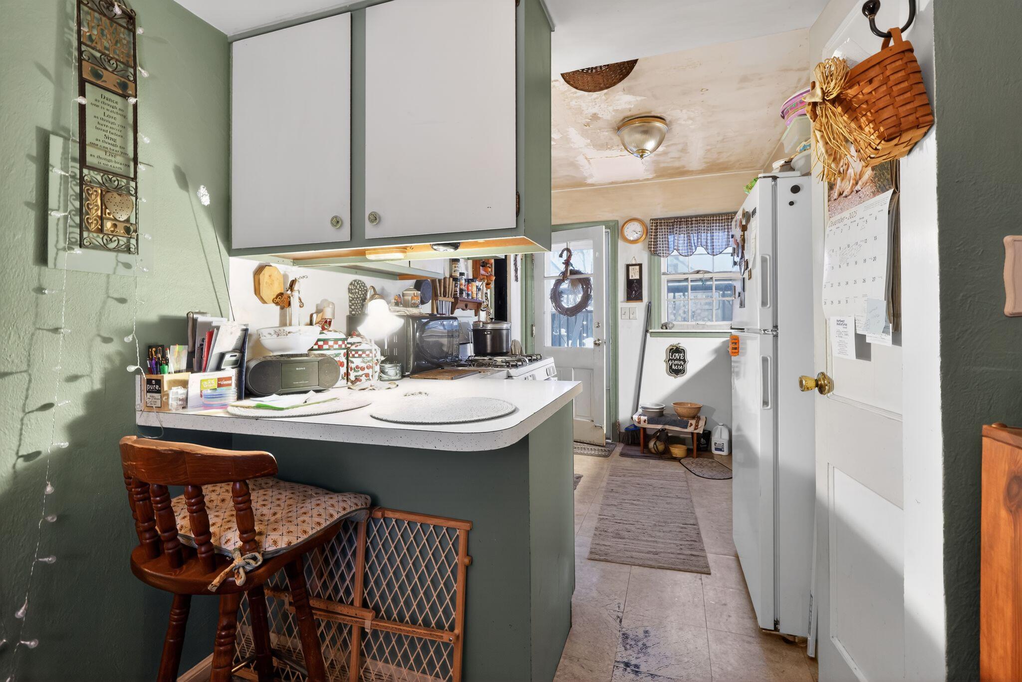 1027 Fox Street La Porte, IN 46350 - Photo 9 of 16 a kitchen with a sink and cabinets