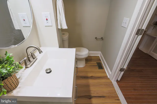 a bathroom with a sink and a toilet