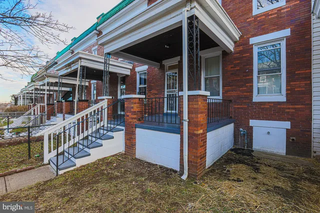 a view of a house with wooden floor and a large window