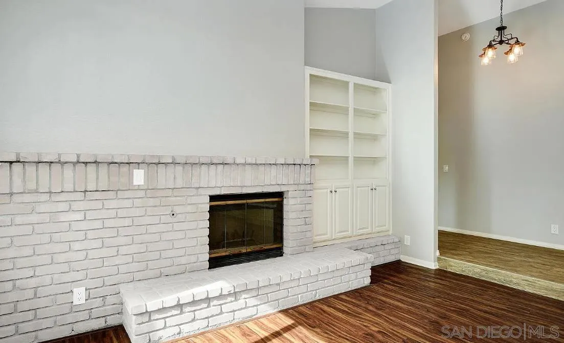 14525 Millards Ranch Lane Poway, CA 92064 - Photo 8 of 29 a living room with a fireplace