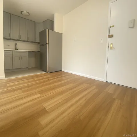 a view of a kitchen with a sink