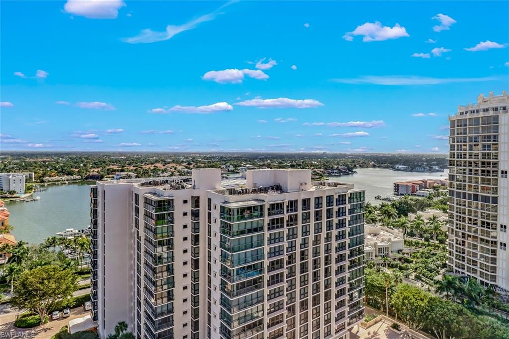 4041 Gulf Shore Boulevard North, Unit PH4 Naples, FL 34103 - Photo 5 of 35 a view of a city with tall buildings