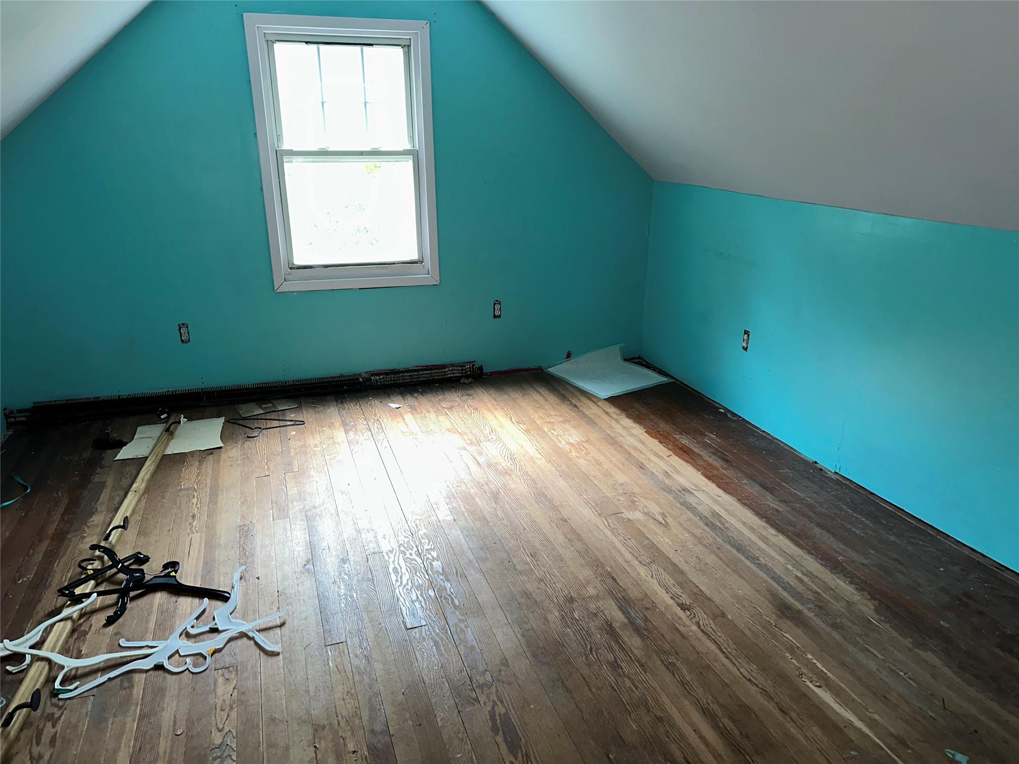 77 Lincoln Road Medford, NY 11763 - Photo 10 of 14 a view of a room with wooden floor and windows