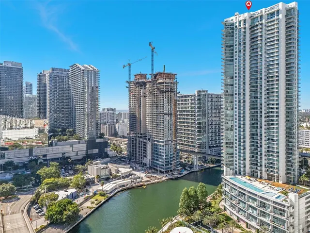 a view of city with tall buildings