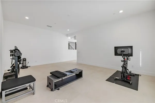 a spacious bathroom with a double vanity sink mirror and double