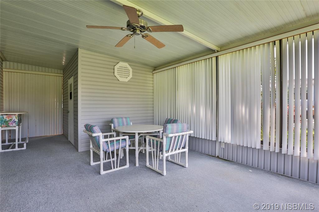 720 Navigators Way Edgewater, FL 32141 - Photo 28 of 35 a view of a livingroom with furniture