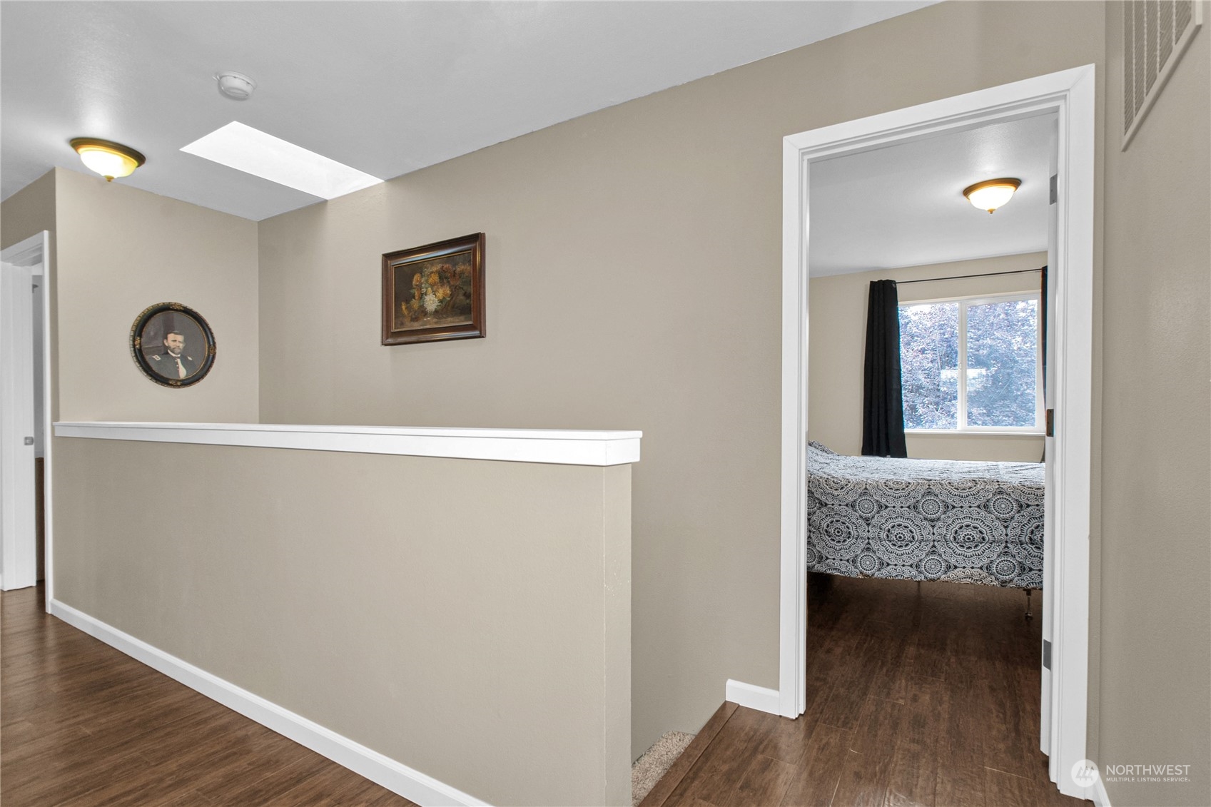 4619 211th Street East Spanaway, WA 98387 - Photo 18 of 36 a view of hallway with wooden floor