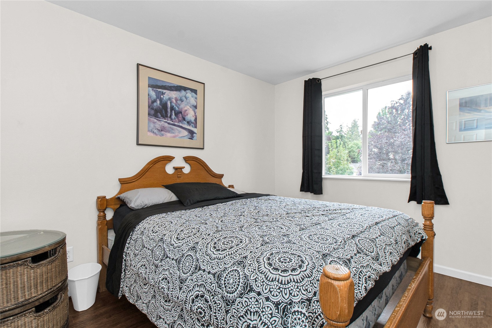 4619 211th Street East Spanaway, WA 98387 - Photo 20 of 36 a bedroom with a bed and a window