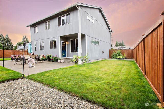 a front view of a house with patio