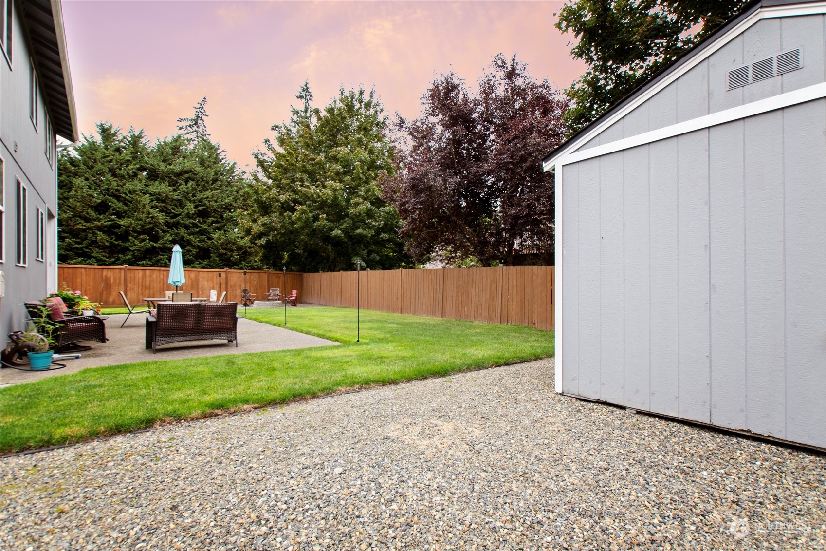 4619 211th Street East Spanaway, WA 98387 - Photo 33 of 36 a backyard of a house with seating space
