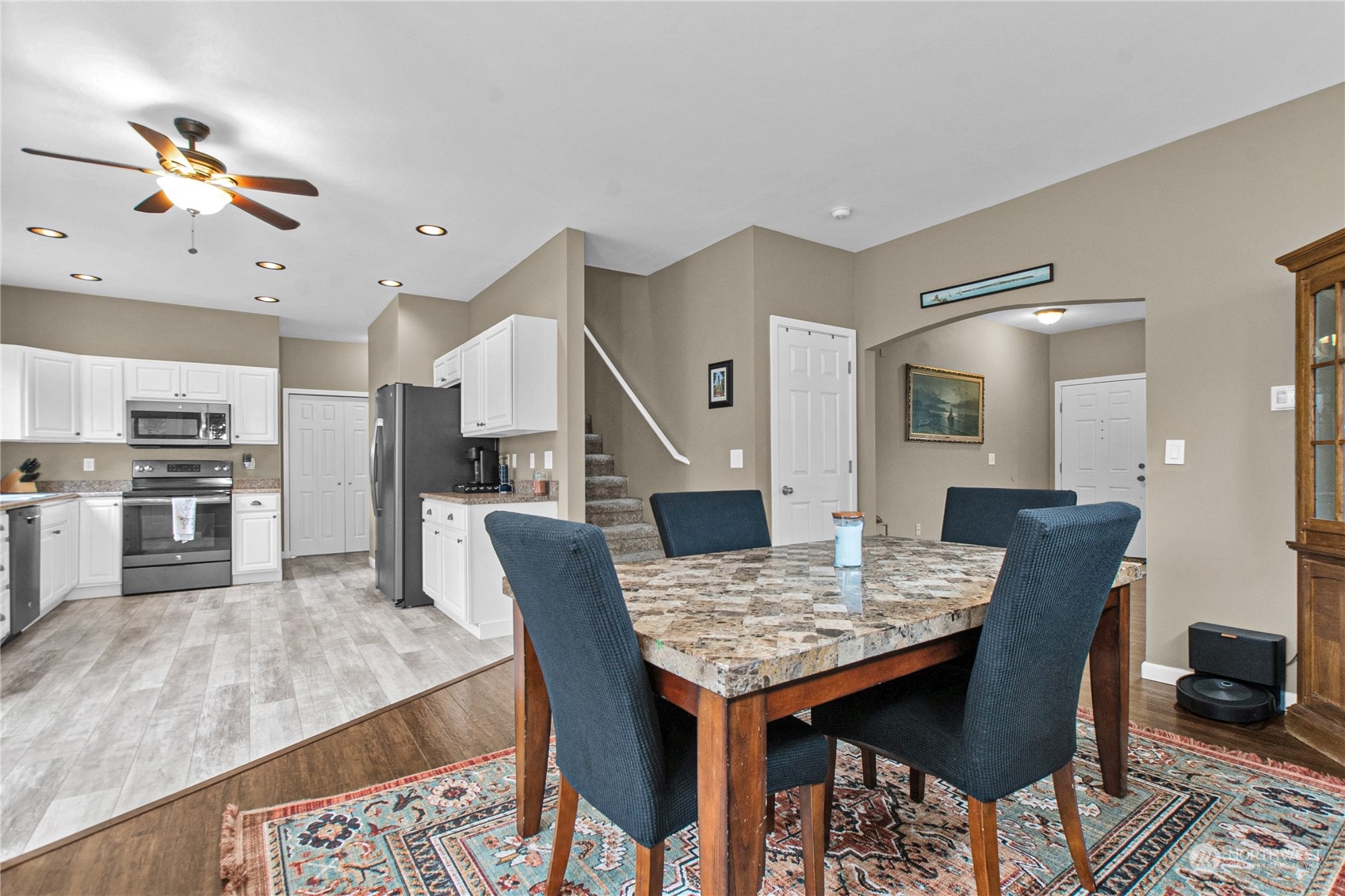 4619 211th Street East Spanaway, WA 98387 - Photo 6 of 36 a view of a dining room with furniture