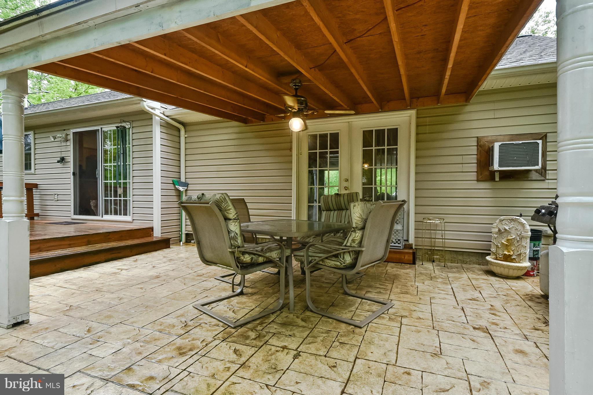 194 Norman Road Stafford, VA 22554 - Photo 25 of 30 Covered stone patio for shade & relaxation