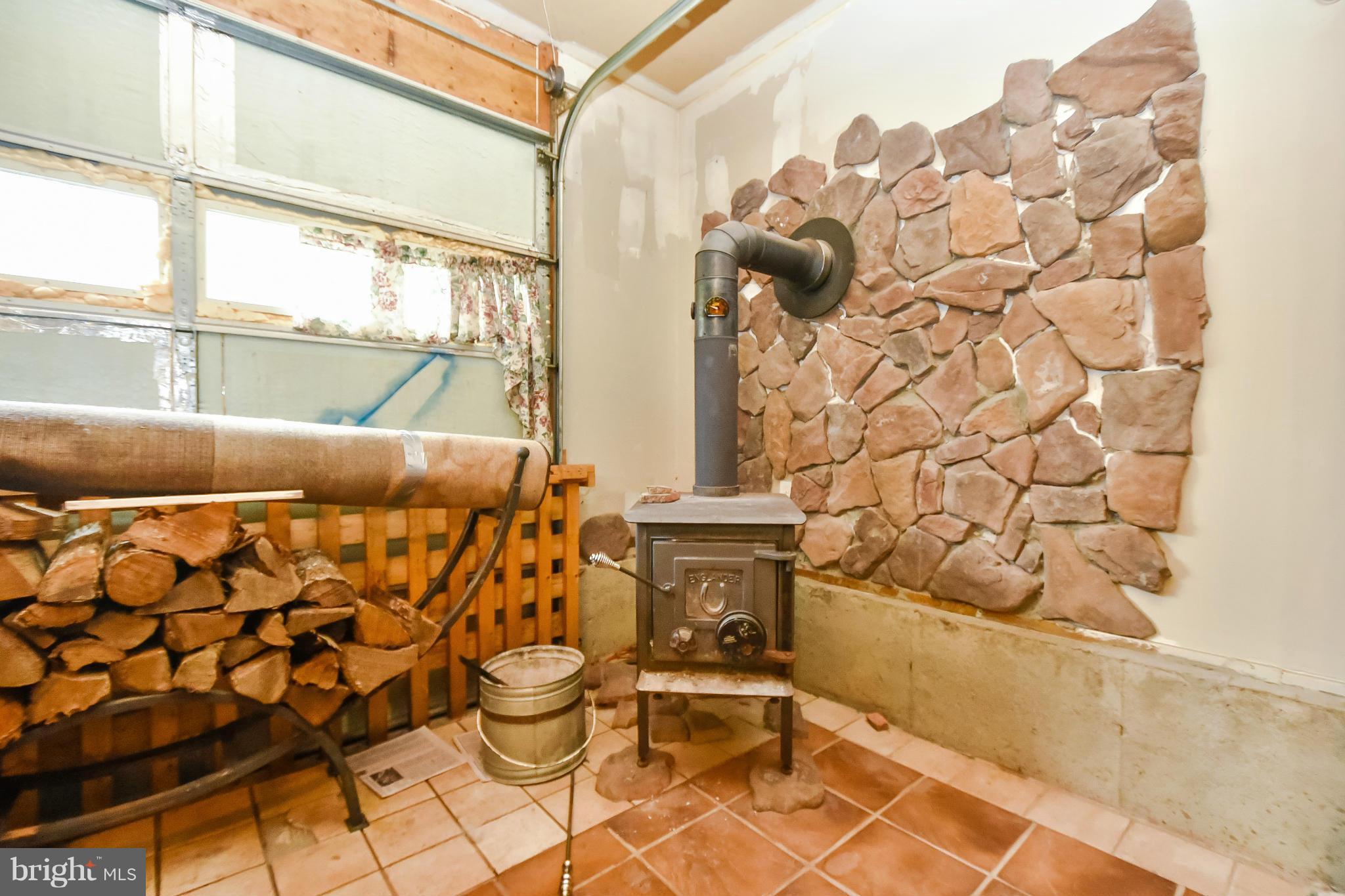 194 Norman Road Stafford, VA 22554 - Photo 27 of 30 IWood stove in Garage