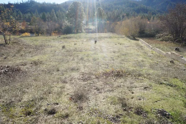 a view of outdoor space and green field