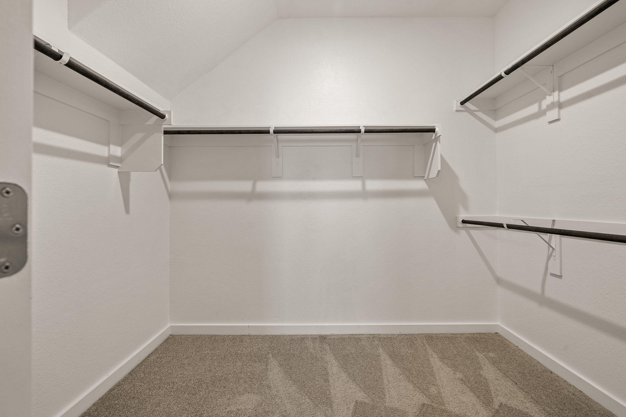 2233 Calvert Drive Leander, TX 78641 - Photo 18 of 32 The spacious walk-in closet offers plentiful hanging and shelving space.