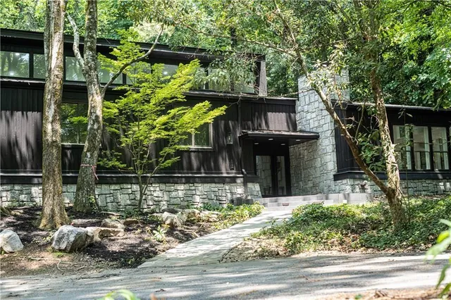 a view of a house with a small pool