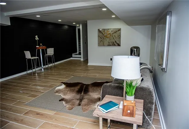 a view of a yard with iron fence