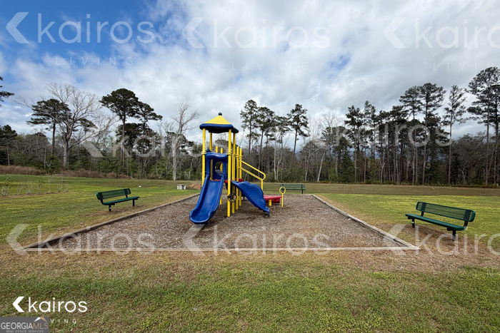 101 St Matthew Way Springfield, GA 31329 - Photo 27 of 30 a view of a park with swings and slides