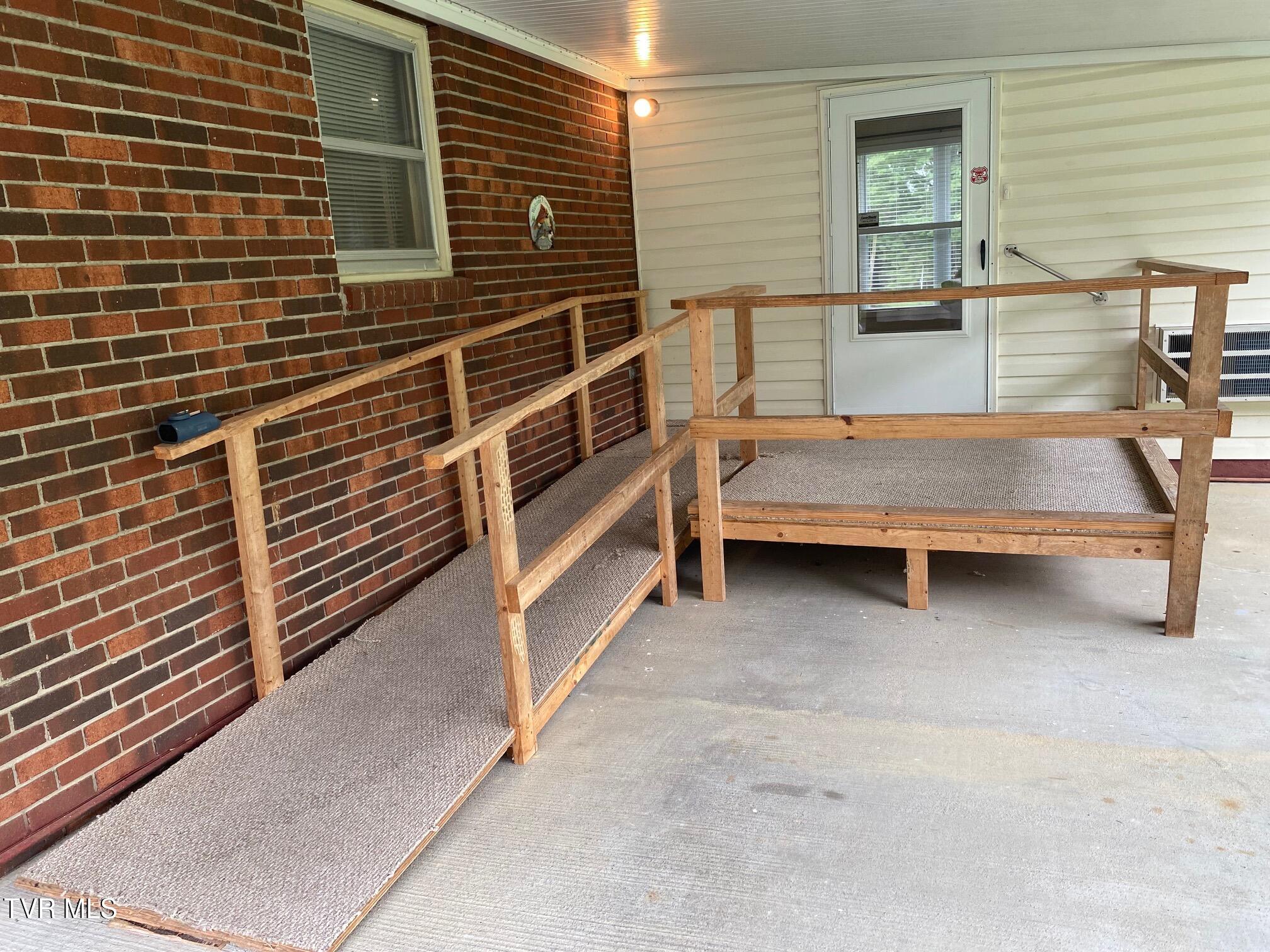 3204 Marbleton Road Unicoi, TN 37692 - Photo 17 of 114 Carport with ramp and deck porch
