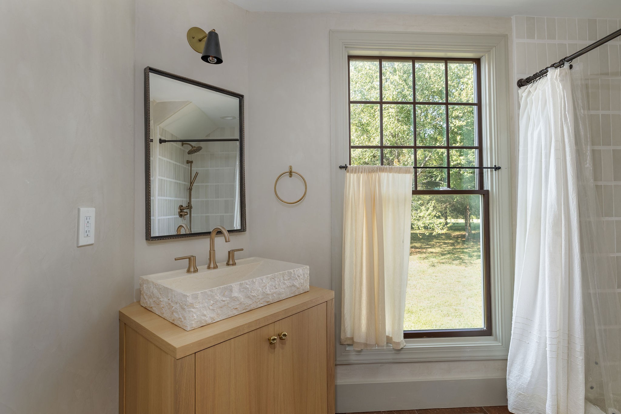 6238 Arno Road Franklin, TN 37064 - Photo 36 of 59 a bathroom with a sink and a mirror
