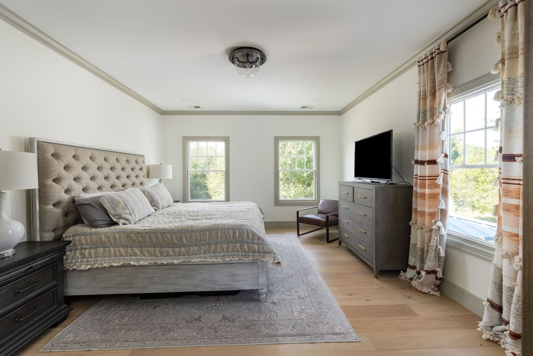 6238 Arno Road Franklin, TN 37064 - Photo 43 of 59 a bedroom with a bed and flat screen tv