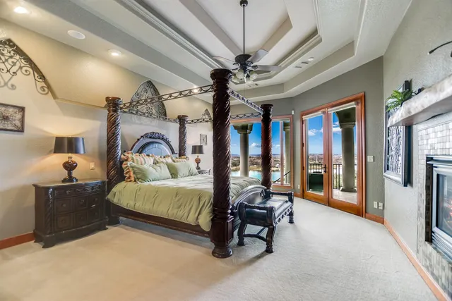 a bedroom with furniture and a chandelier