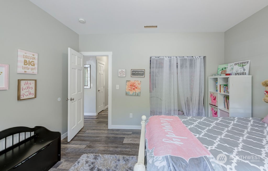 1365 Pitcher Canyon Road Wenatchee, WA 98801 - Photo 27 of 40 a bedroom with a bed and a walk in closet