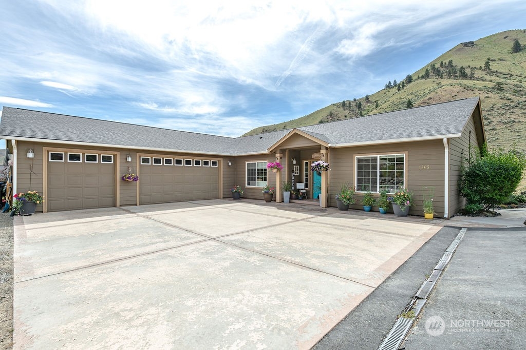 1365 Pitcher Canyon Road Wenatchee, WA 98801 - Photo 3 of 40 front view of a house with a outdoor space