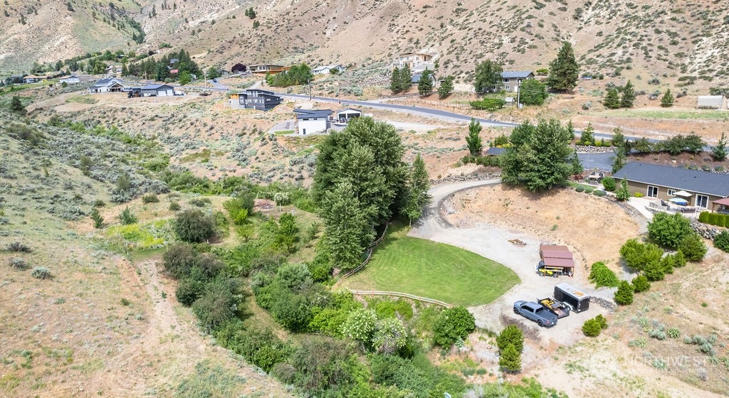 1365 Pitcher Canyon Road Wenatchee, WA 98801 - Photo 39 of 40 an aerial view of residential houses with outdoor space