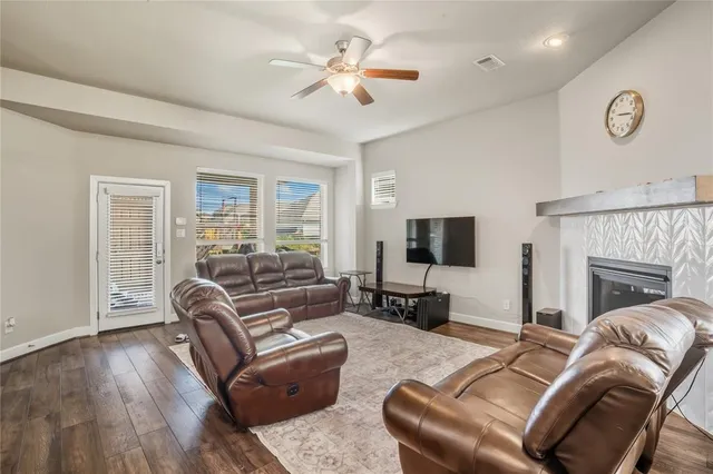 a kitchen with white cabinets and a stove