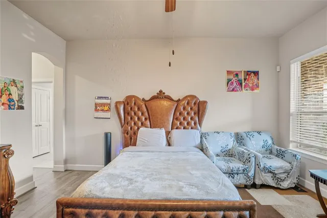 a bathroom with a double vanity sink mirror double and bathtub
