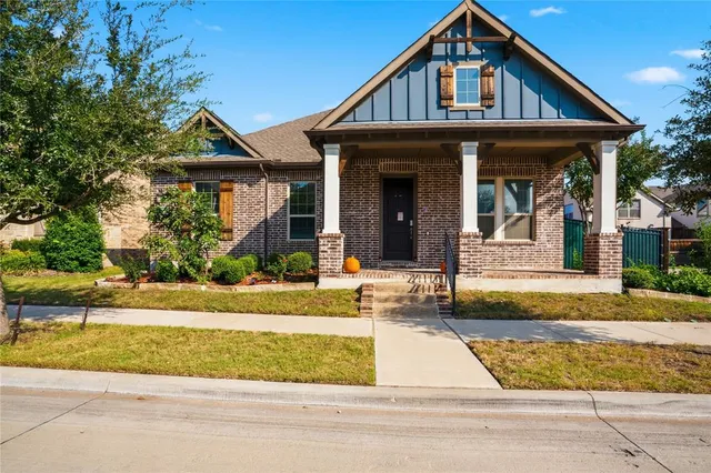 an aerial view of a house with swimming pool
