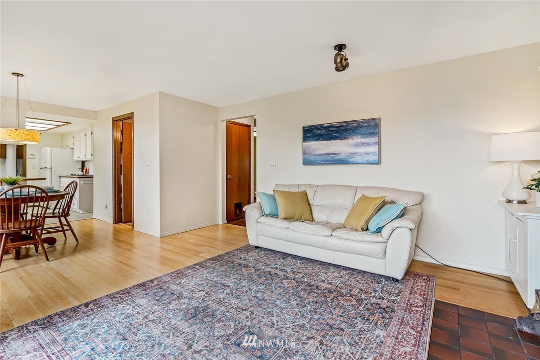 9513 Tveit Road Arlington, WA 98223 - Photo 17 of 40 a living room with furniture and wooden floor