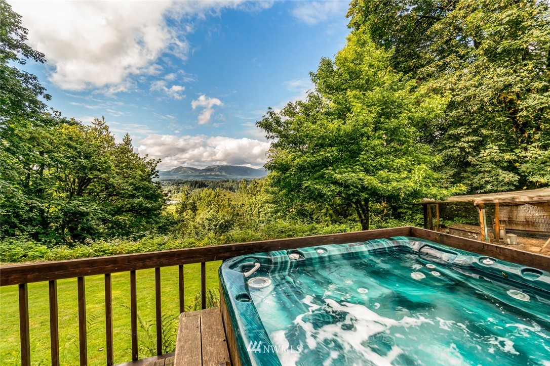 9513 Tveit Road Arlington, WA 98223 - Photo 33 of 40 swimming pool view from a balcony