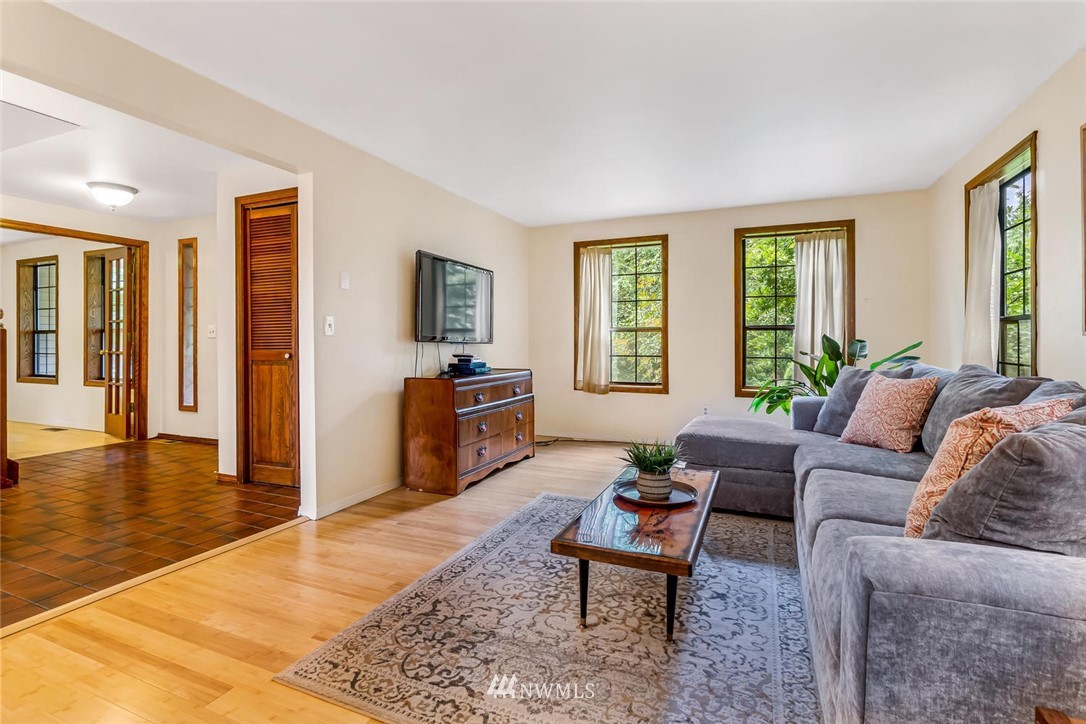 9513 Tveit Road Arlington, WA 98223 - Photo 7 of 40 a living room with furniture and a window