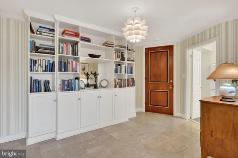 a kitchen with stainless steel appliances a refrigerator and cabinets