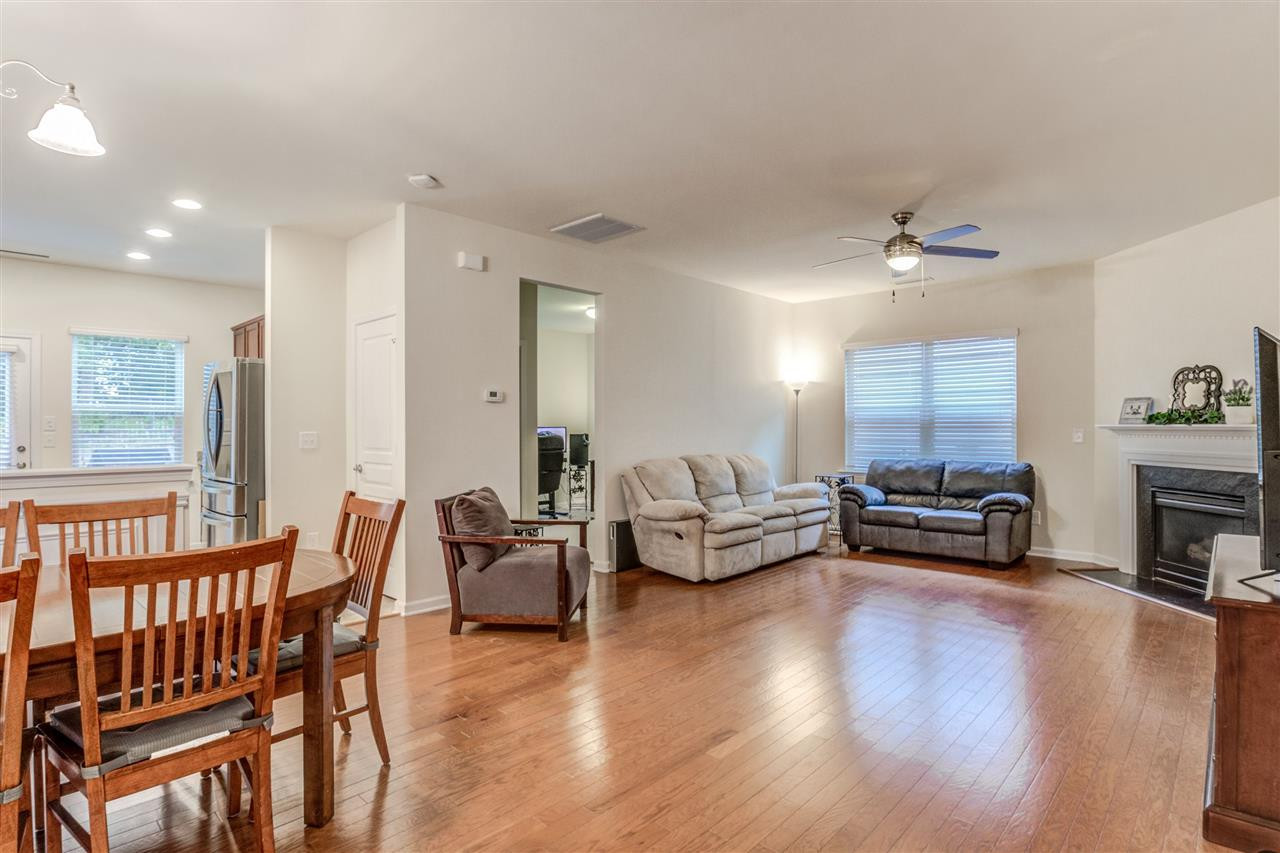 Gleaming Hardwoods, fresh paint, plenty of space in this family room for relaxing or entertaining! Family Room