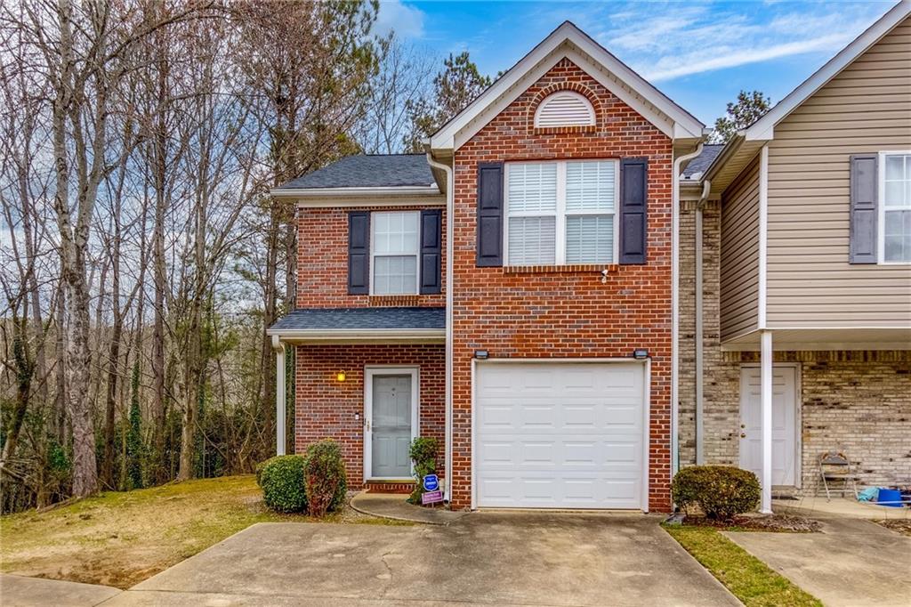3032 Western Sunset Decatur, GA 30034 - Photo 1 of 1 a front view of a house with garden