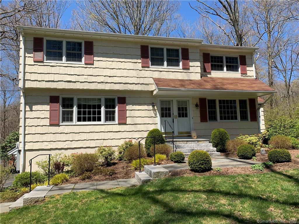 87 Riverside Drive Ridgefield, CT 06877 - Photo 1 of 1 a house view with a seating space