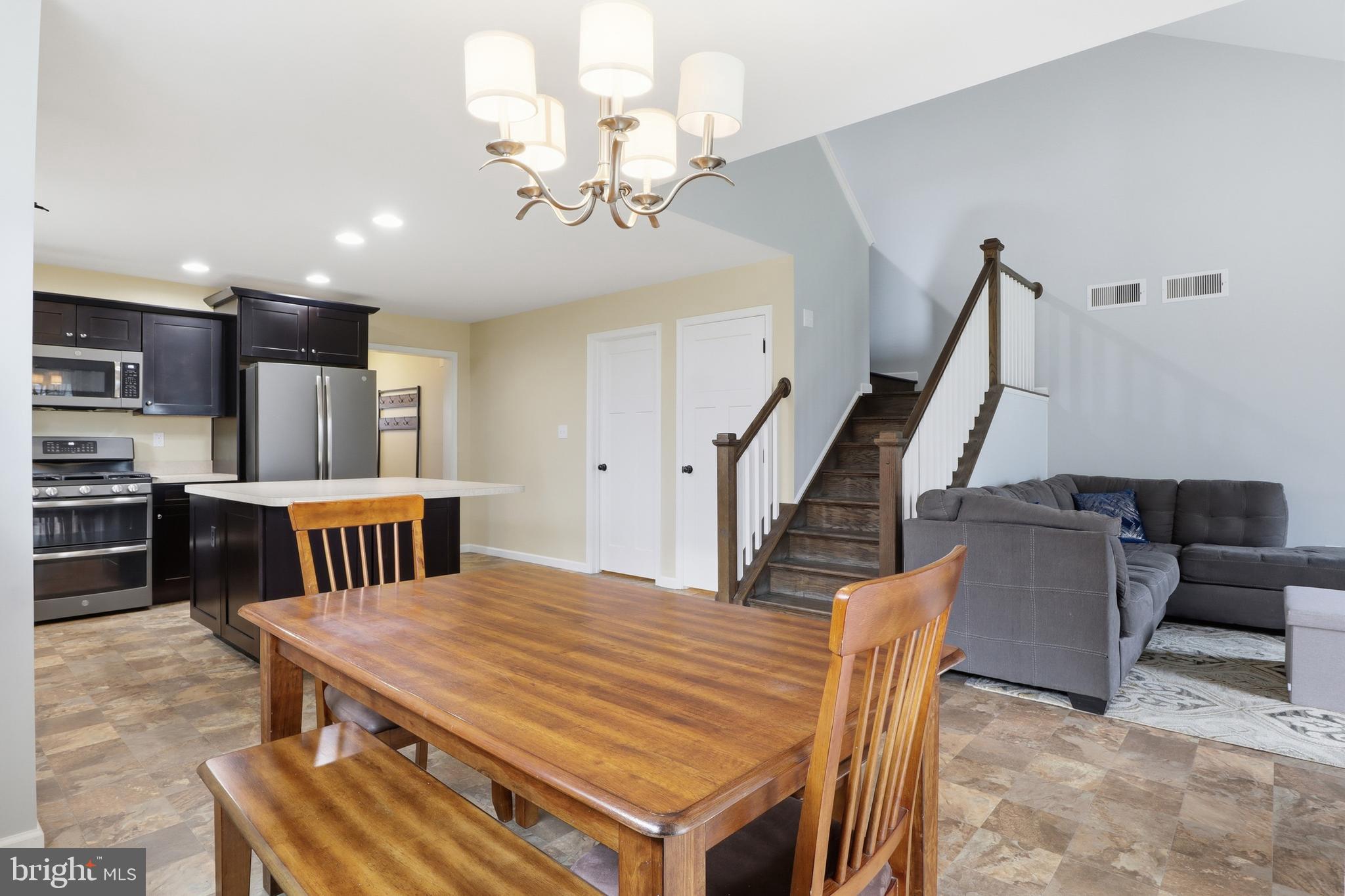 2606 Woodspring Drive York, PA 17402 - Photo 17 of 60 a view of a dining room with furniture