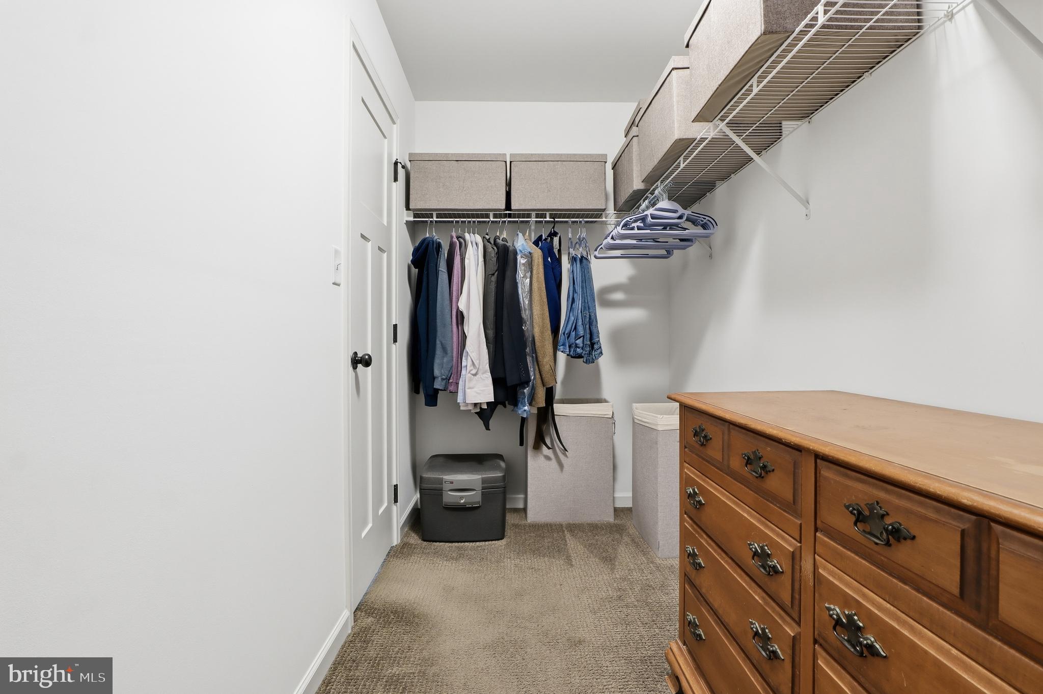2606 Woodspring Drive York, PA 17402 - Photo 25 of 60 a view of walk in closet with clothes