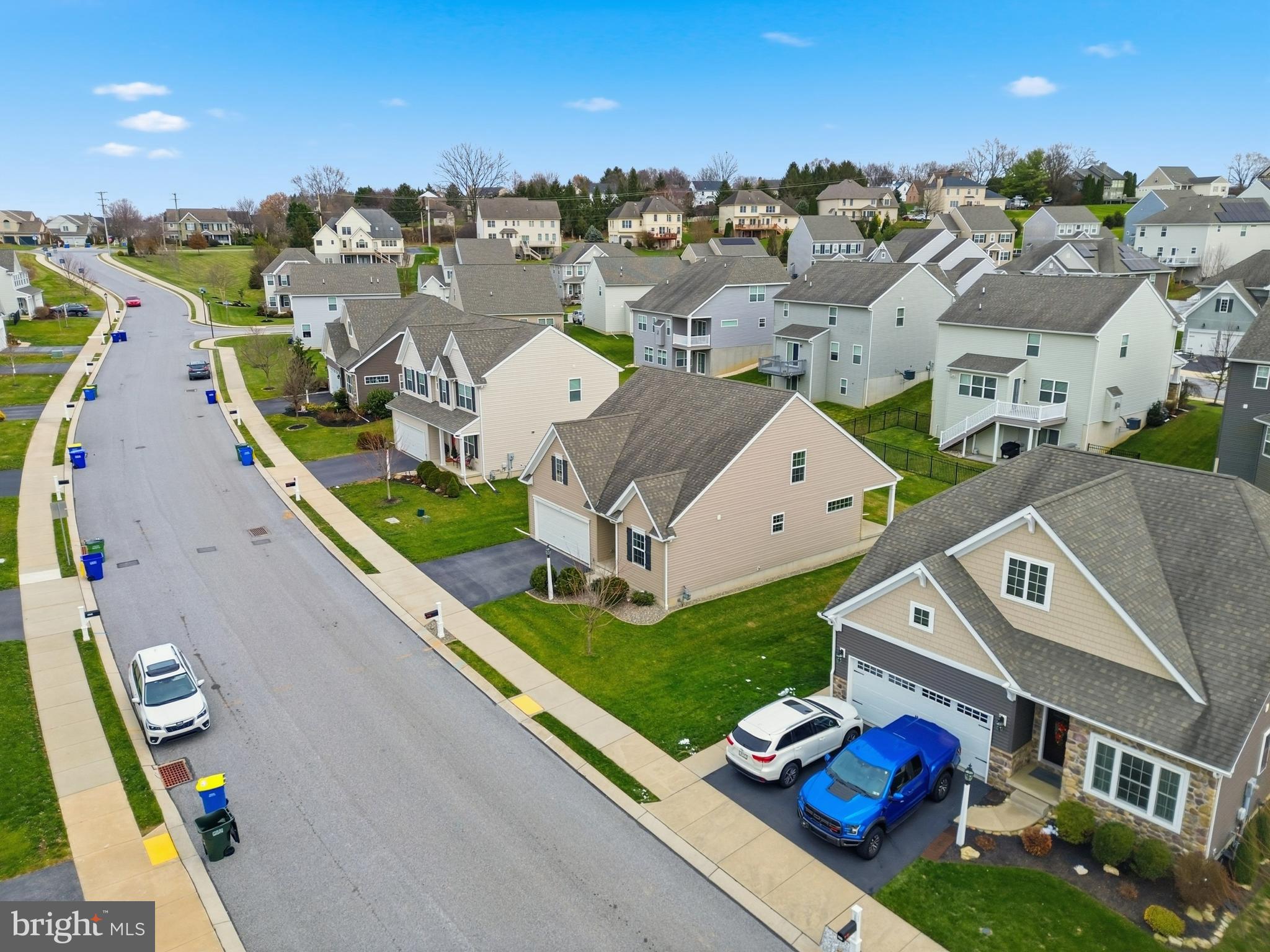 2606 Woodspring Drive York, PA 17402 - Photo 46 of 60 an aerial view of multiple houses with yard