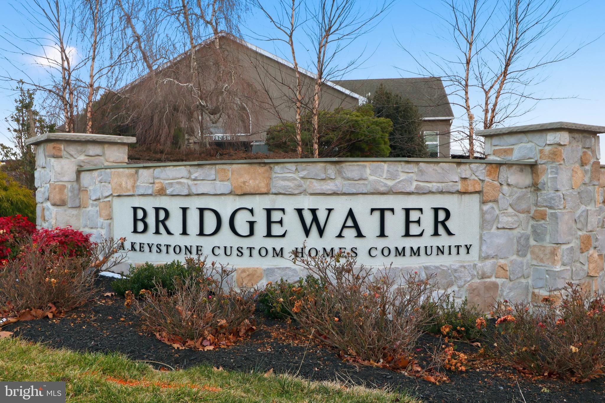 2606 Woodspring Drive York, PA 17402 - Photo 48 of 60 a sign broad in front of red brick house