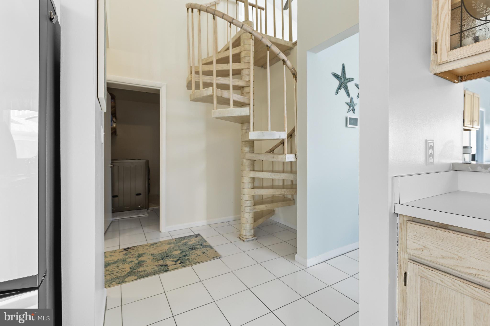 13 Hunters Point Millsboro, DE 19966 - Photo 8 of 29 Circular Staircase Viewed From Dining