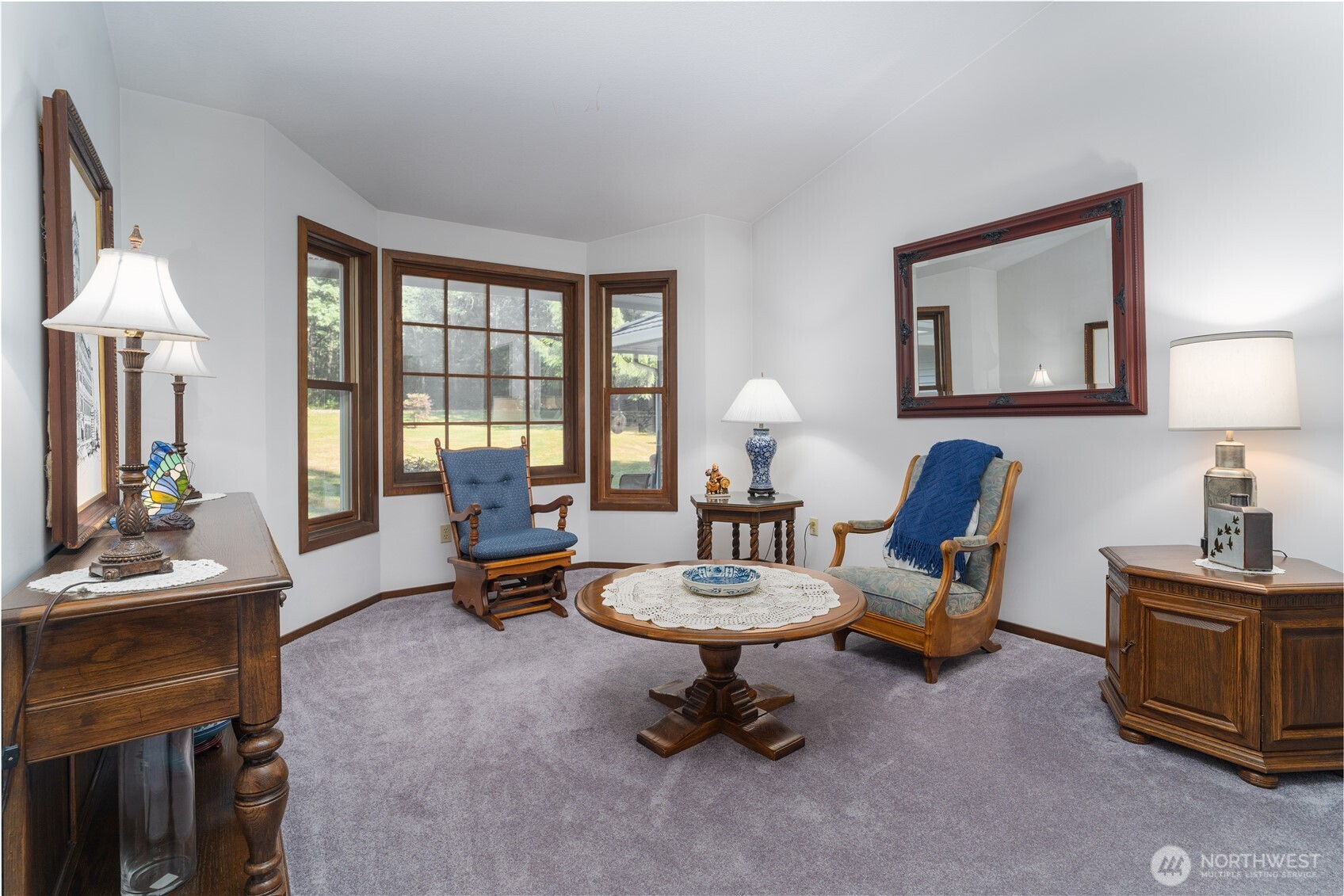 2102 Mark Street Northeast Olympia, WA 98516 - Photo 9 of 37 a living room with furniture a table and a large window