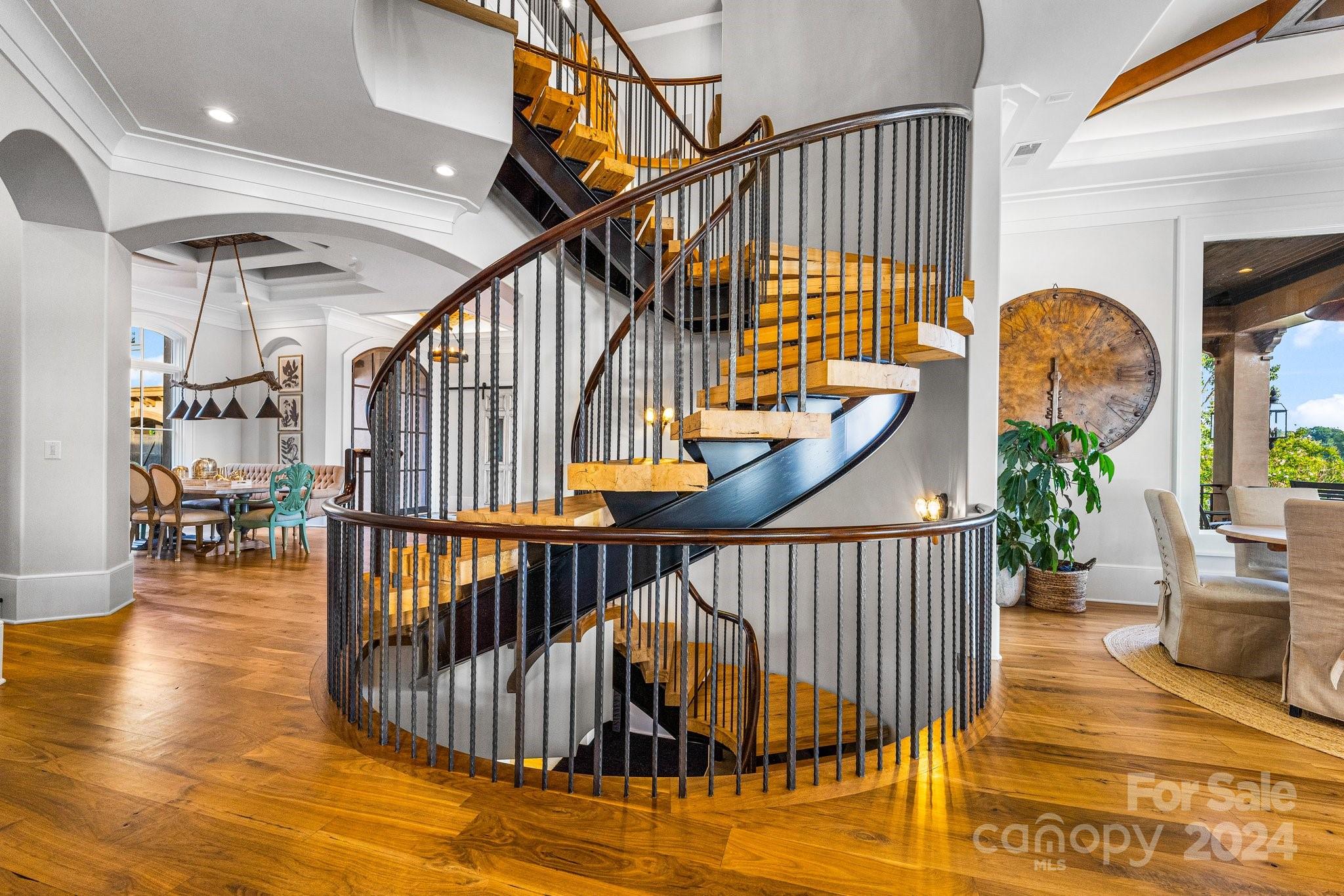 16700 Tinker Place Cornelius, NC 28031 - Photo 13 of 47 a view of staircase with railing and white walls