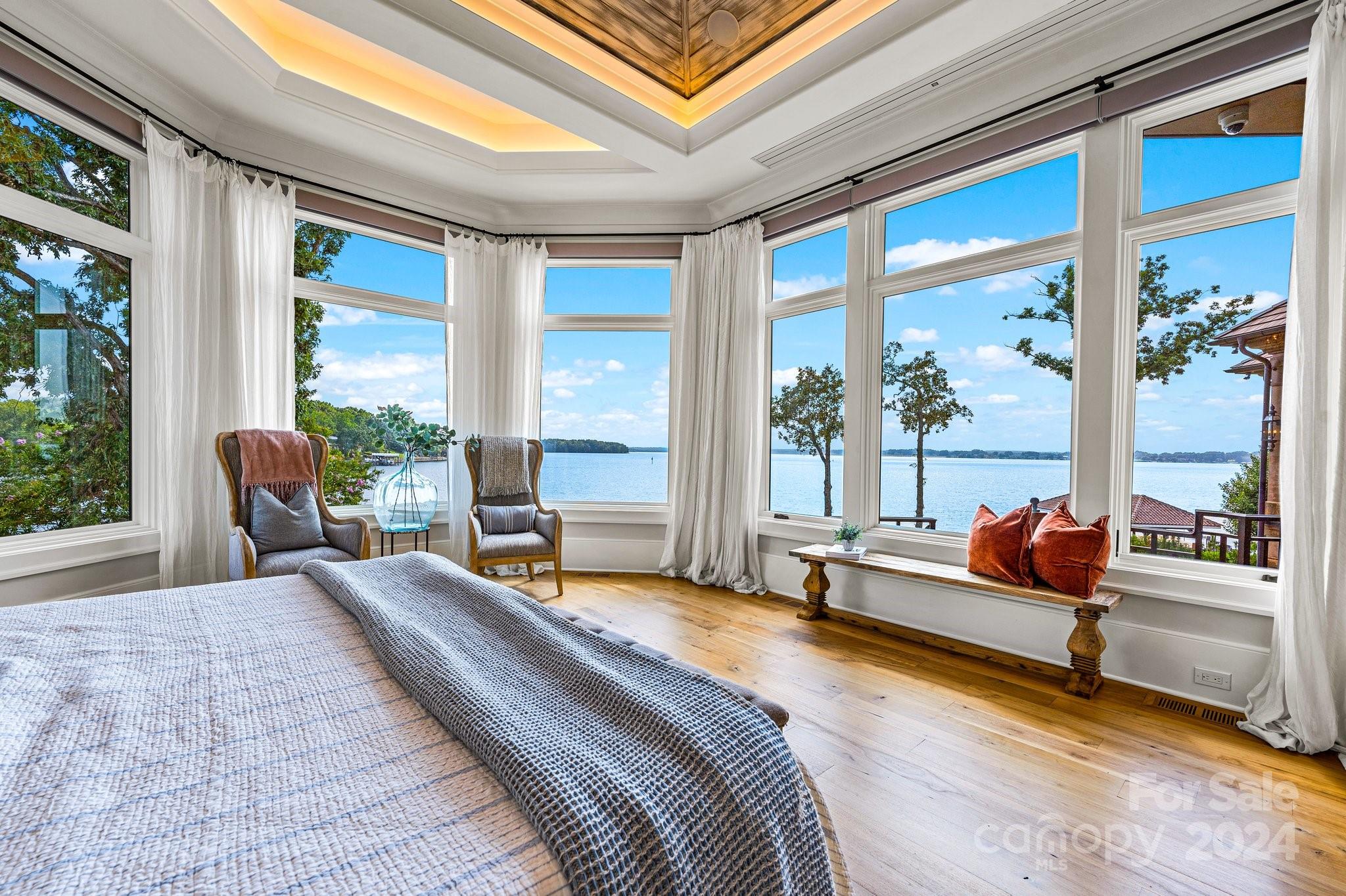 16700 Tinker Place Cornelius, NC 28031 - Photo 22 of 47 a bedroom with furniture and a large window