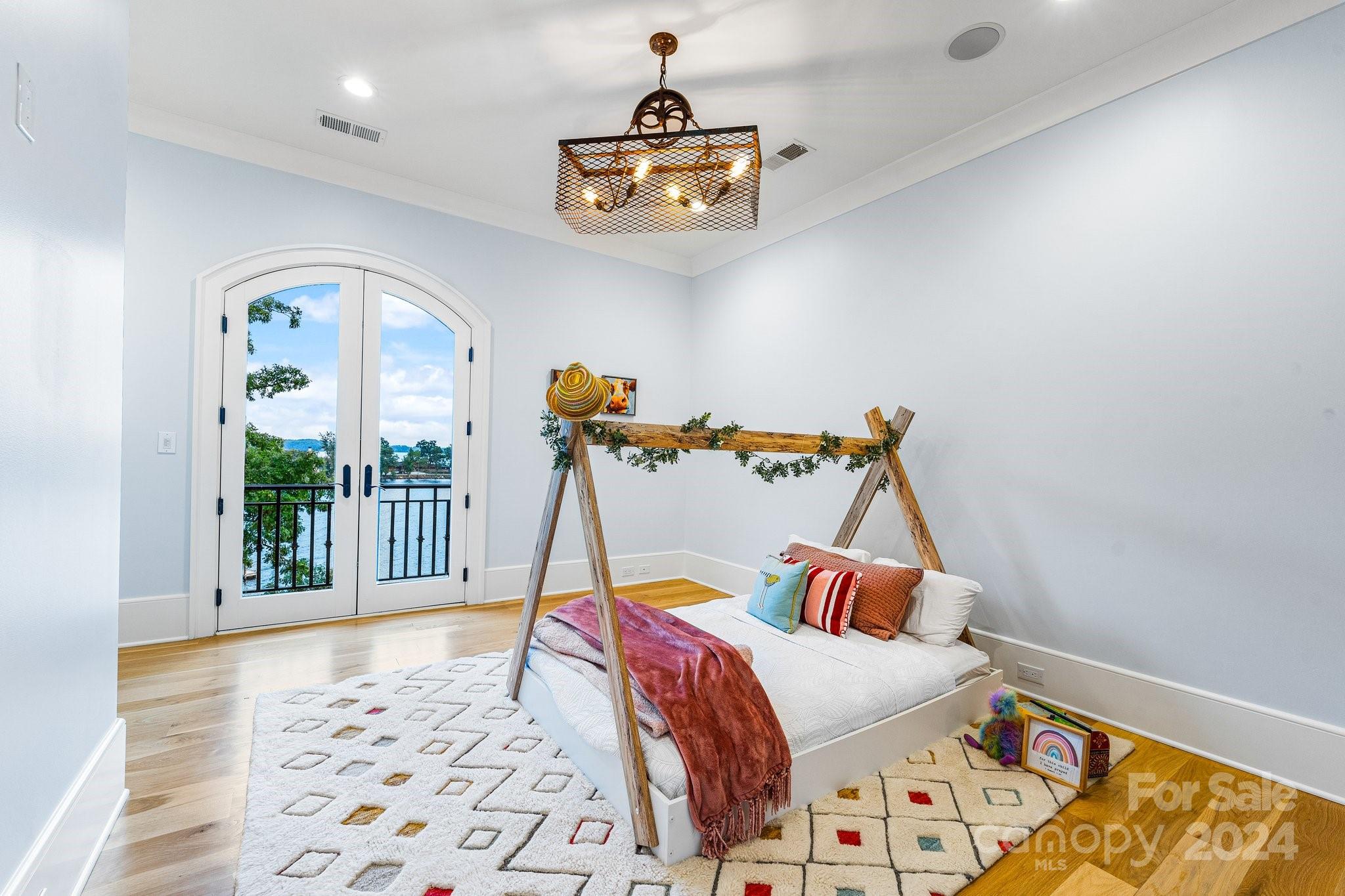 16700 Tinker Place Cornelius, NC 28031 - Photo 31 of 47 a bedroom with a bed and a window