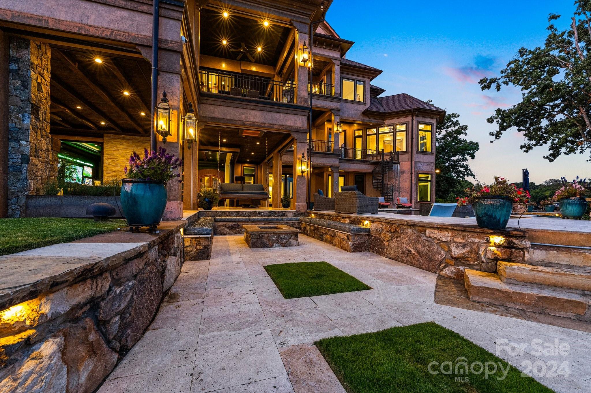 16700 Tinker Place Cornelius, NC 28031 - Photo 46 of 47 a front view of a building with swimming pool and patio